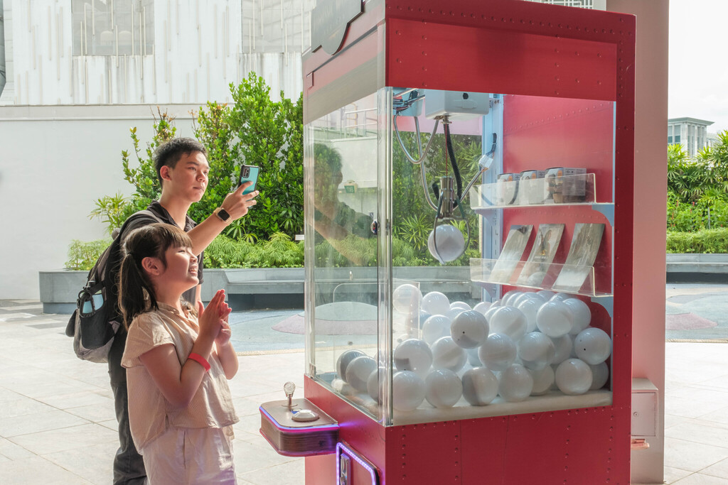 CapitaLand's Colossal Dinosaur Experience: Claw Machine