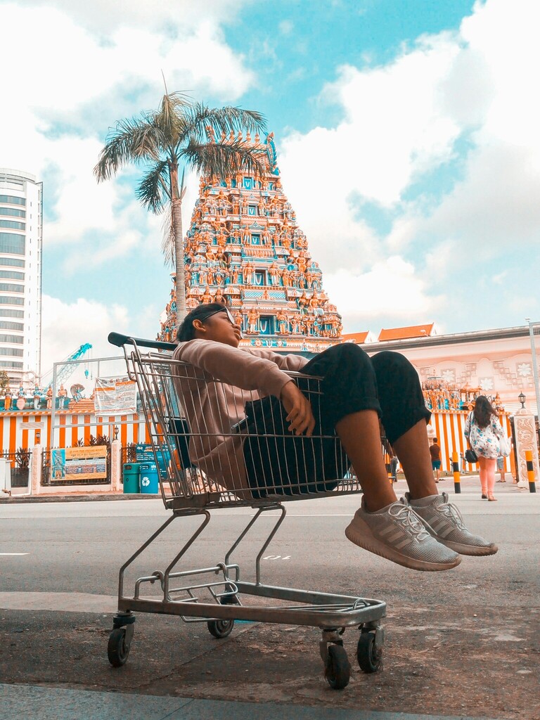 Lazing in a shopping cart in Singapore