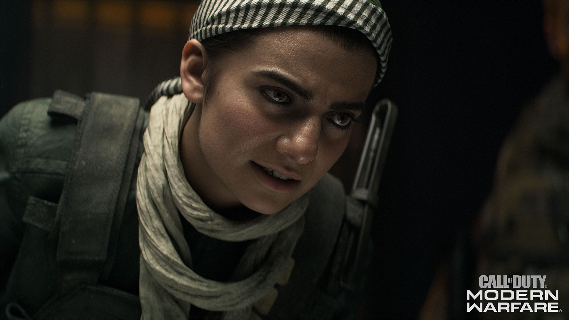 A close-up of a determined woman in a headscarf in Call of Duty: Modern Warfare
