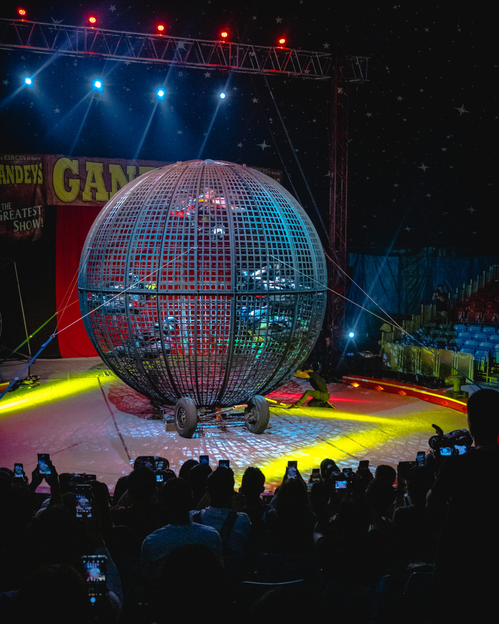 The Thunderdome metal sphere lit in blue at The Great Circus of Europe