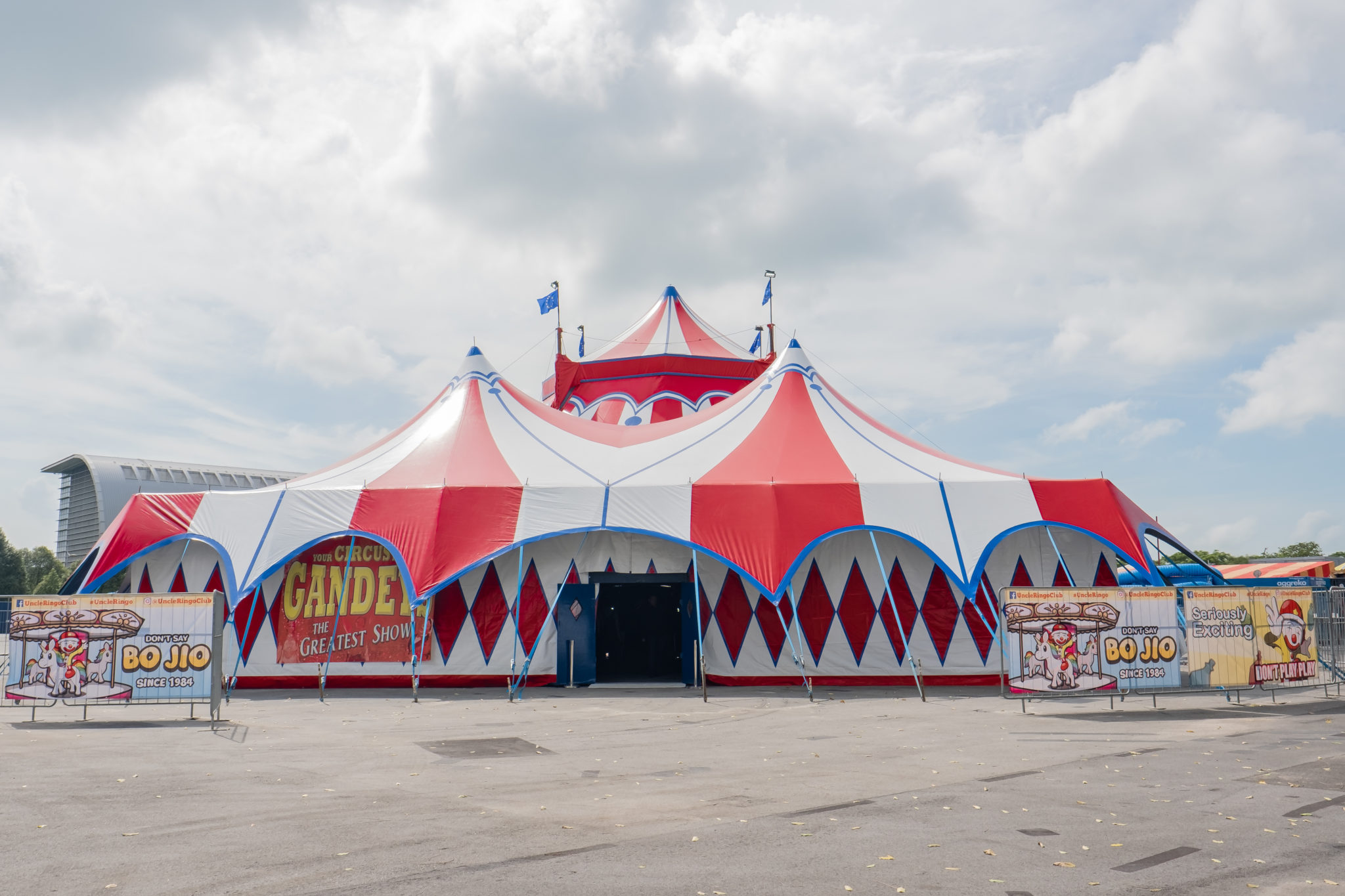 The red and white striped tent of The Great Circus of Europe at Marina Bay