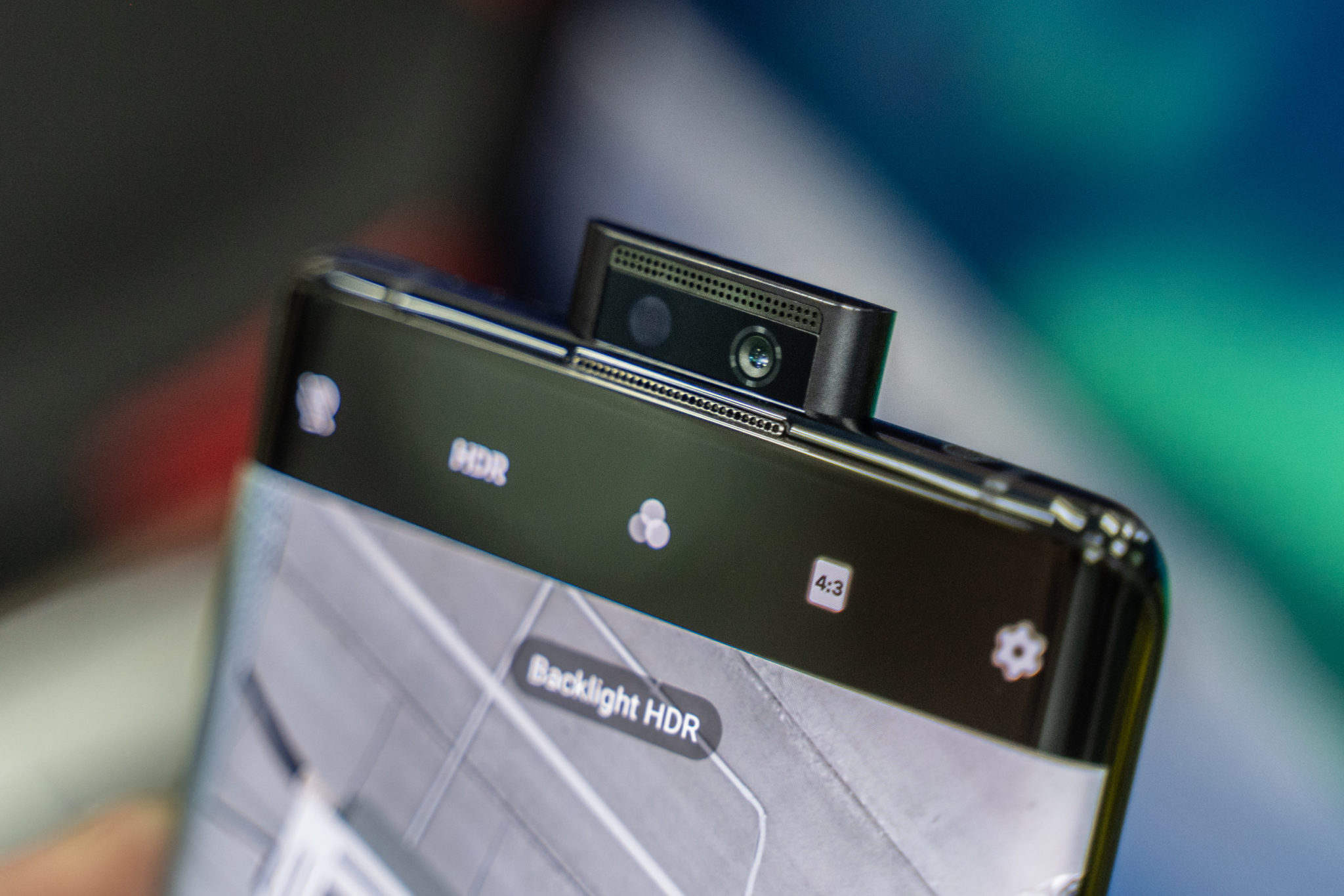 The pop-up selfie camera of the Vivo Nex 3 raised from the top edge