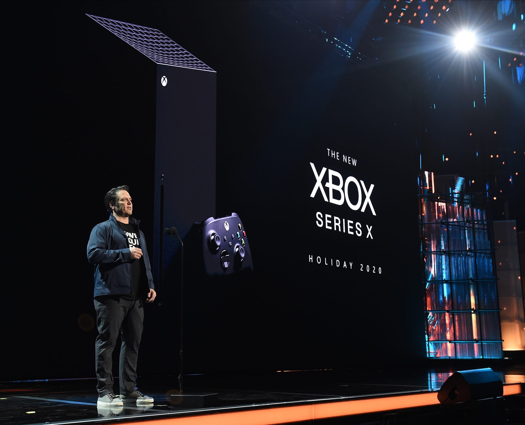 Phil Spencer on stage beside the Xbox Series X at its reveal
