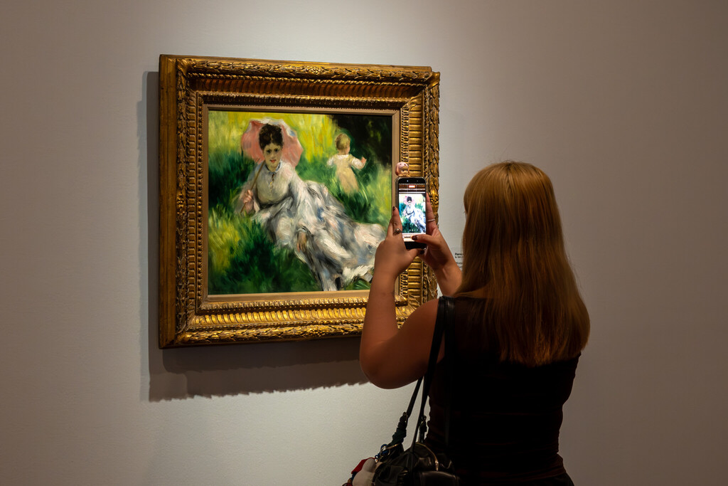 Into the Modern: Woman with a Parasol and Small Child on a Sunlit Hillside
