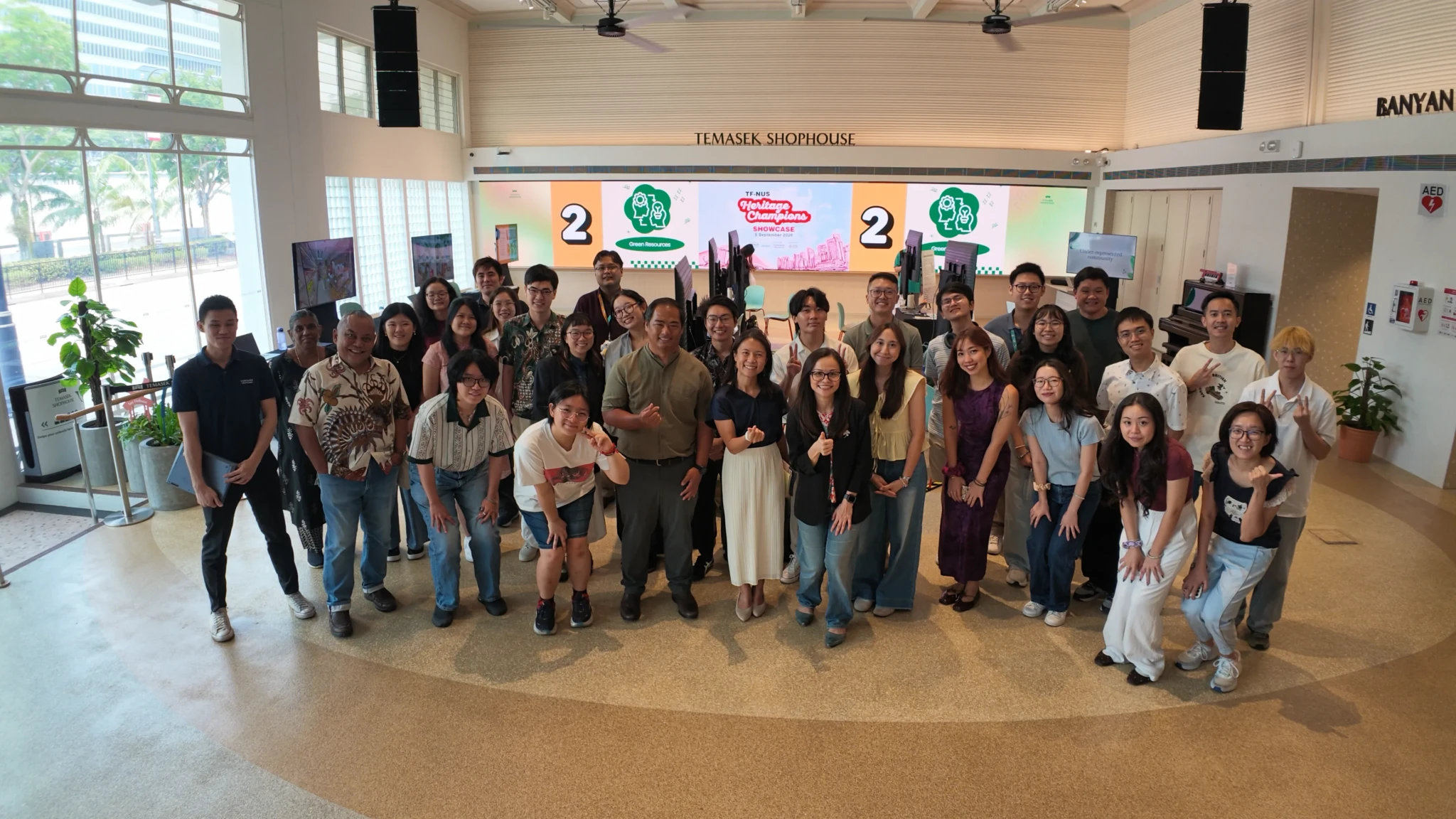 Participants and organisers pose for a group photo at the TF-NUS Heritage Champions Showcase at Temasek Shophouse