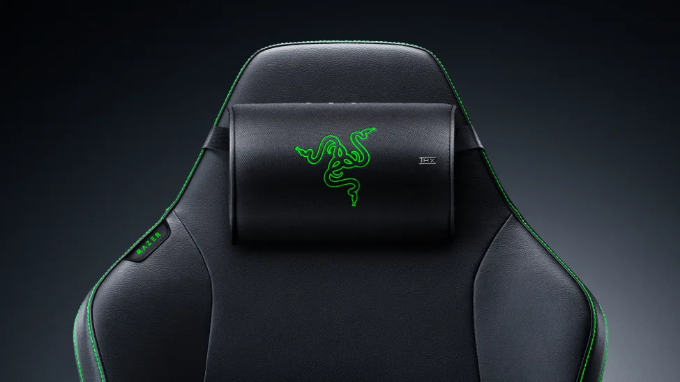 Razer Clio X wireless speaker head cushion mounted on a high-back gaming chair