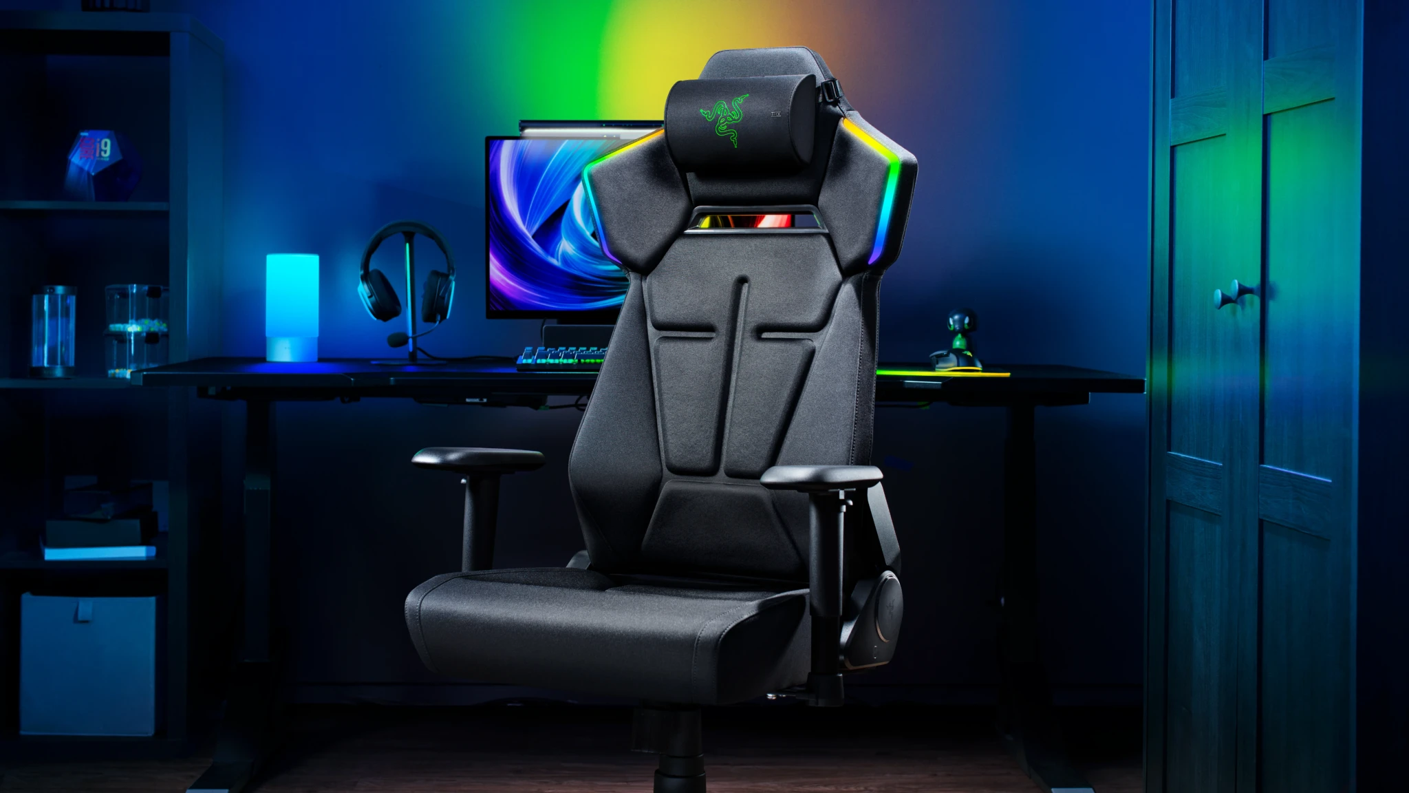 Razer Clio X cushion mounted on the headrest of a black RGB gaming chair