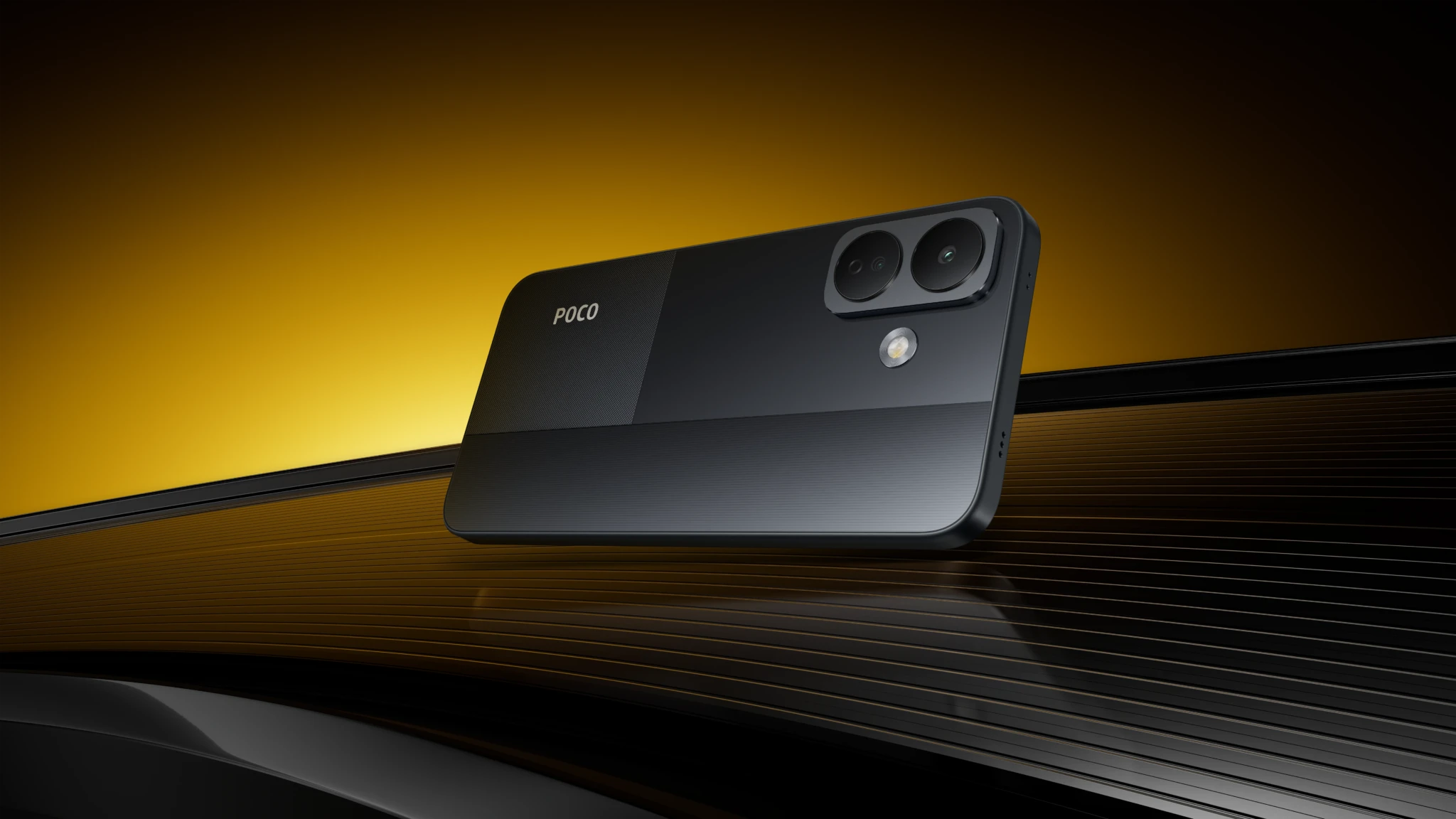 Back of the POCO X8 angled against an amber-lit backdrop