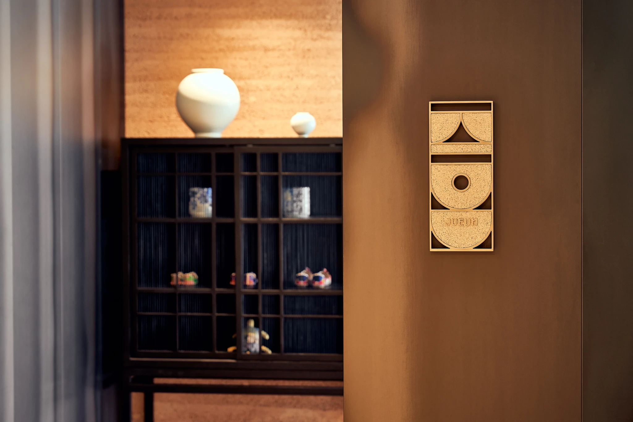 Jueun's signage in minimalist wooden design