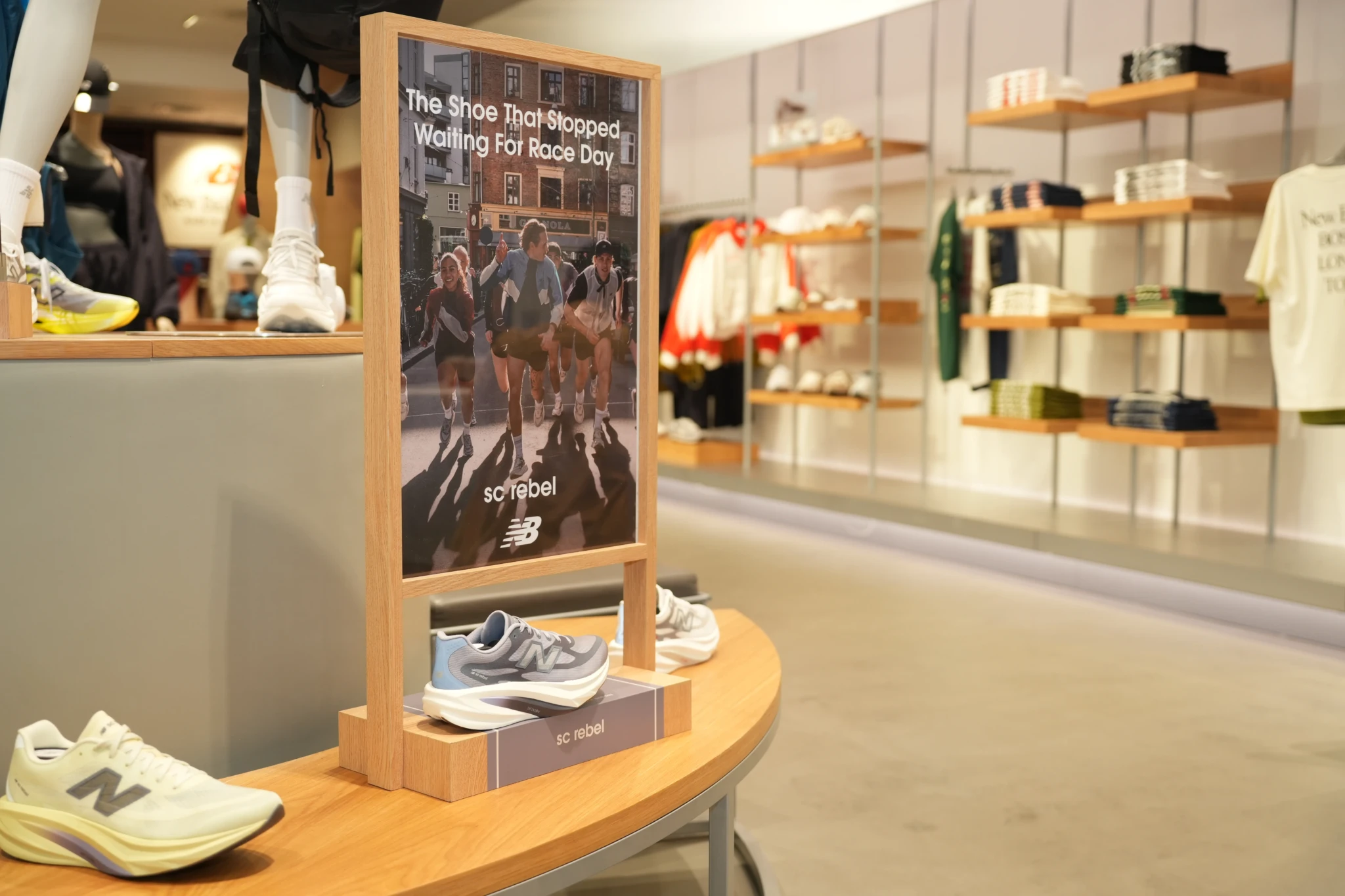 A New Balance store display at Suntec City showing the SuperComp Rebel