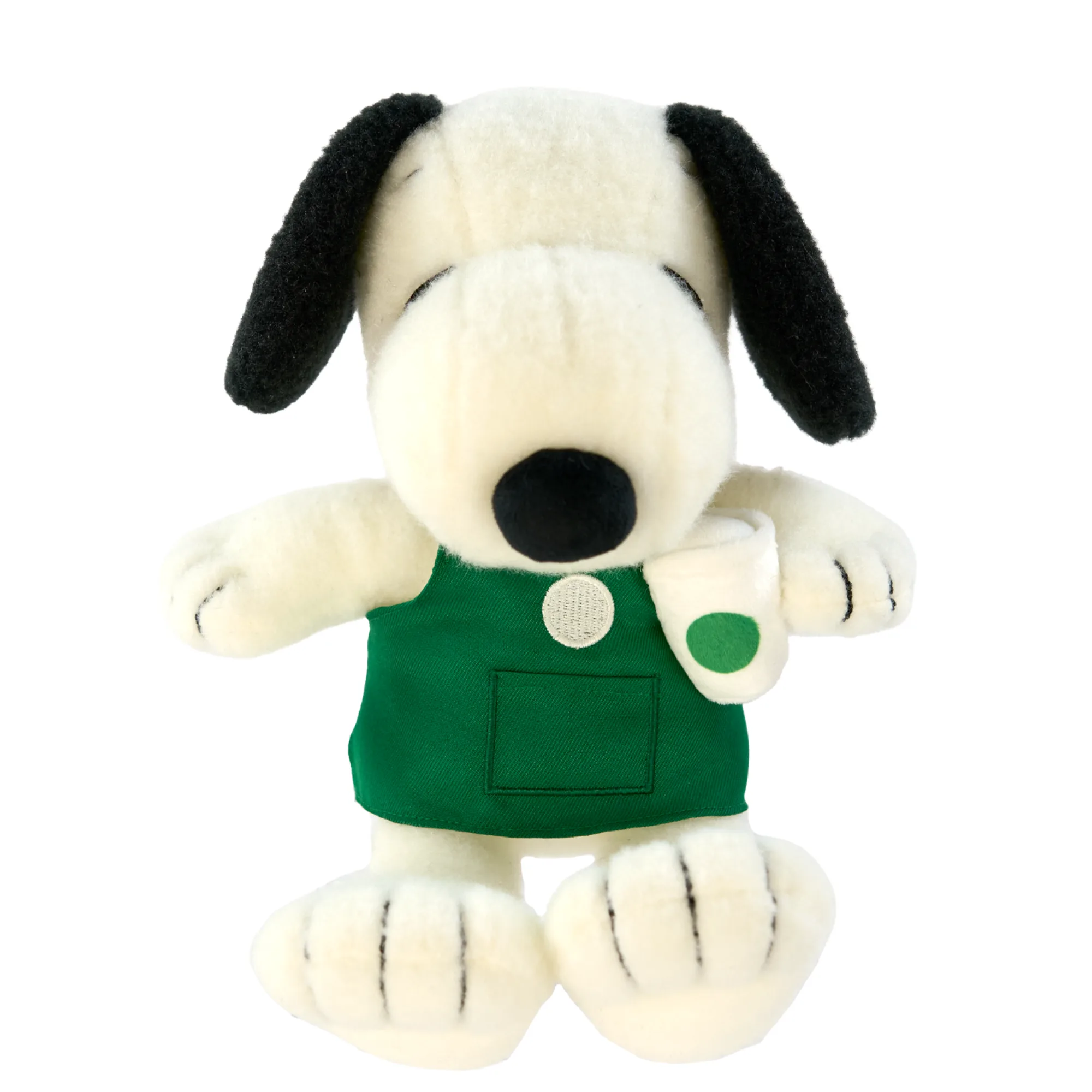 White and black plush dog wearing a green collared shirt from the Peanuts Starbucks collection