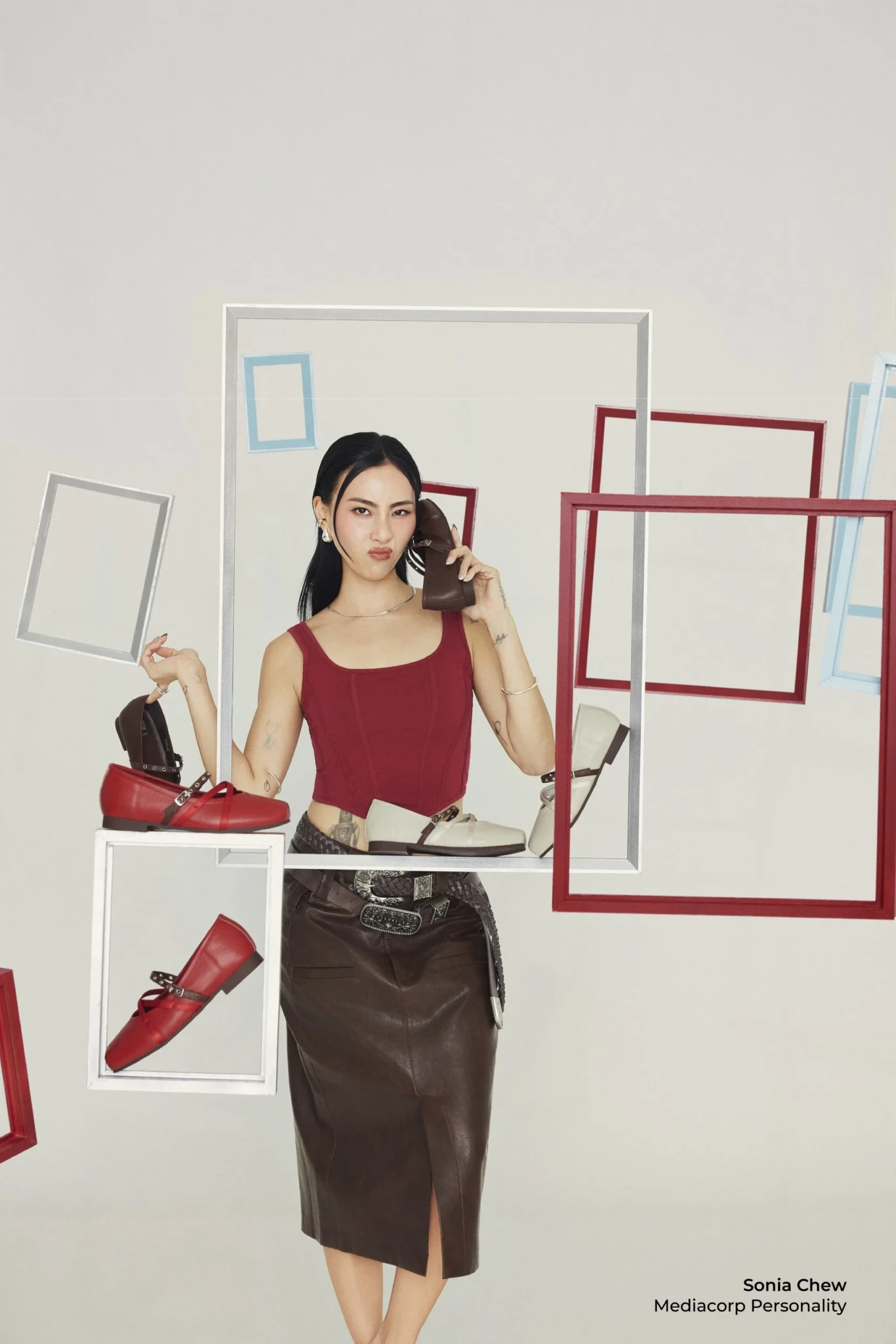 Sonia Chew with the Charli Flats styled against decorative hanging frames