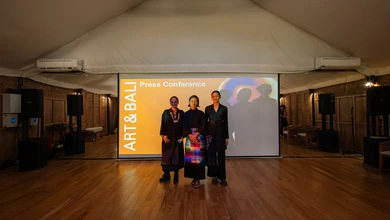 Three speakers standing before the Art & Bali 2026 press conference banner
