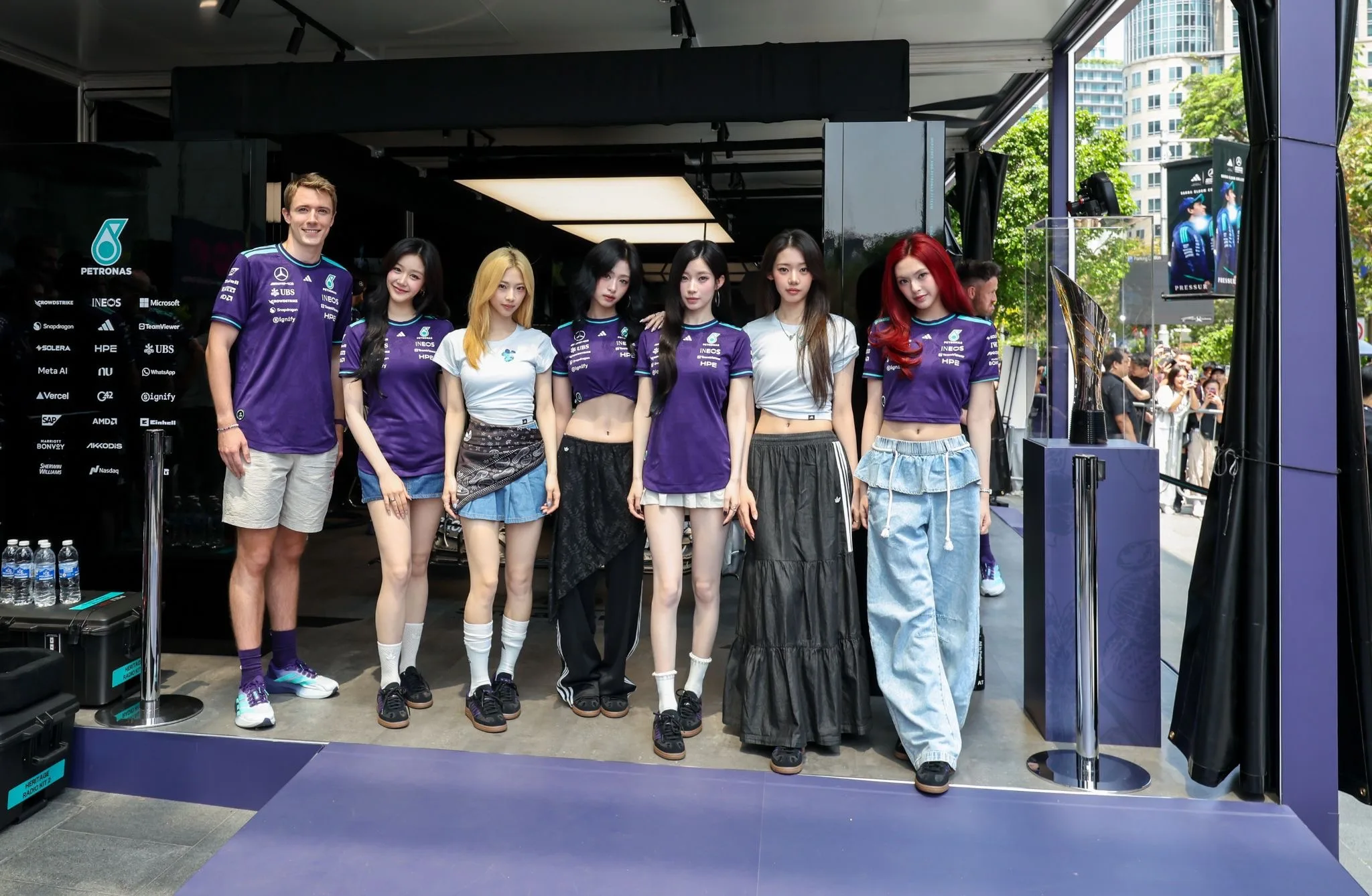 Fred Vesti posing with BABYMONSTER at the adidas Orchard Ignition booth