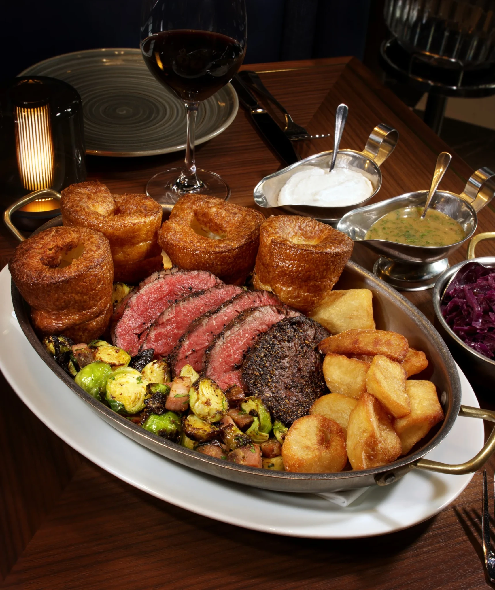 Stags Head Steakhouse's Chateaubriand Sunday Roast with Yorkshire puddings, roast potatoes and Brussels sprouts