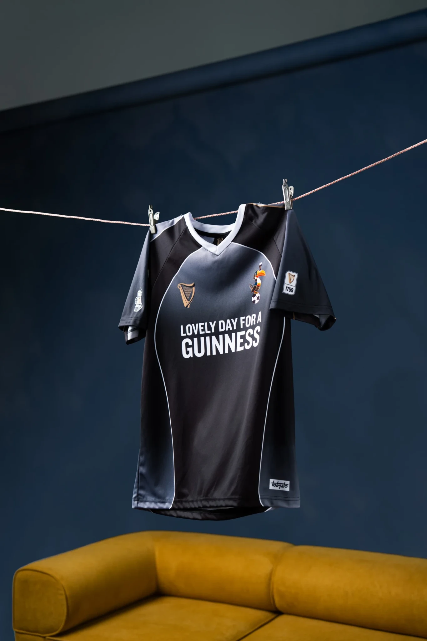 The Guinness x Tobyato jersey hanging on a clothesline