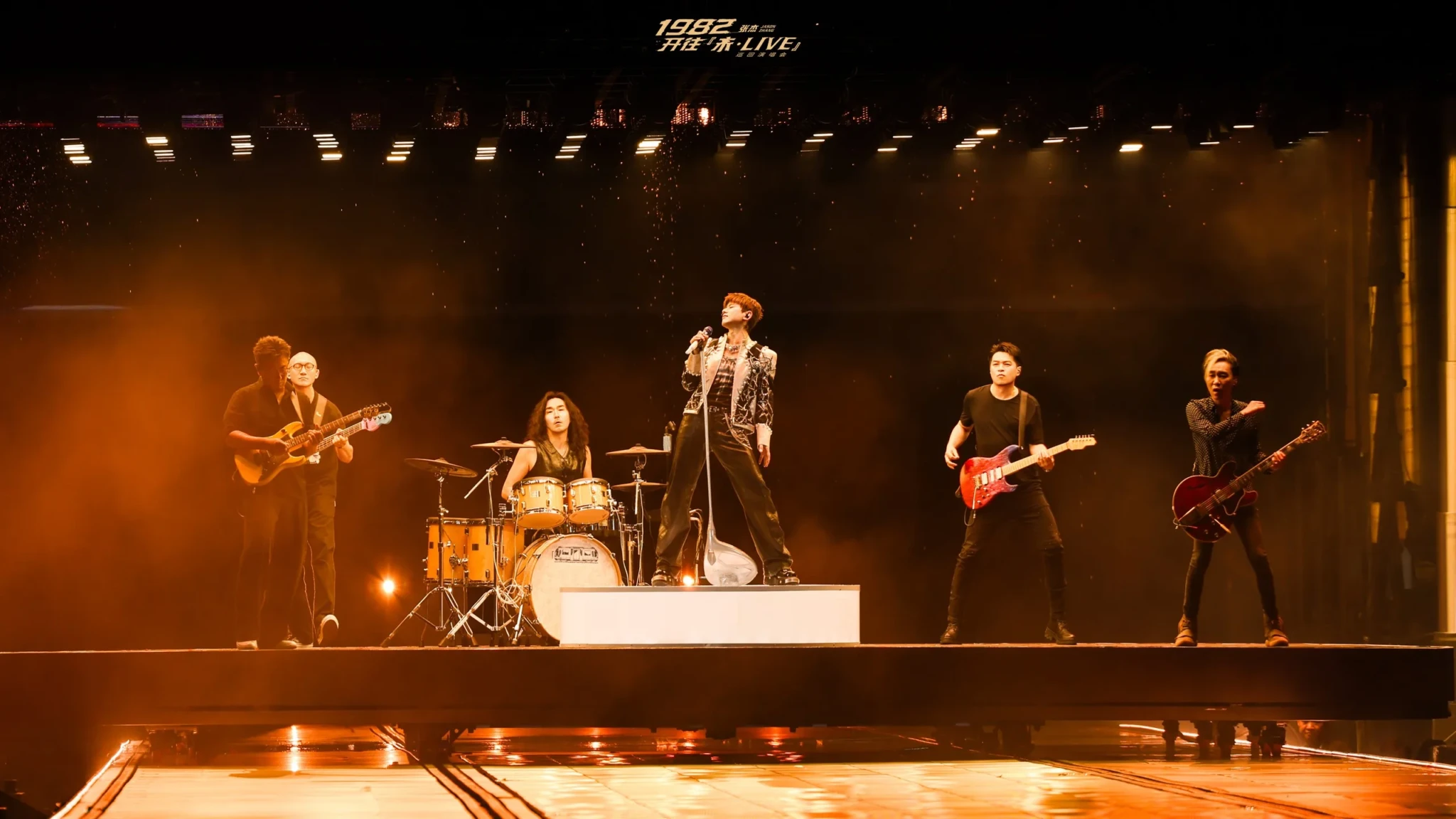 Jason Zhang performing with his band at the Hangzhou tour opener