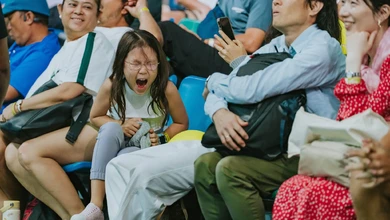 Fans cheer courtside at the Singapore Tennis Open presented by BNP Paribas