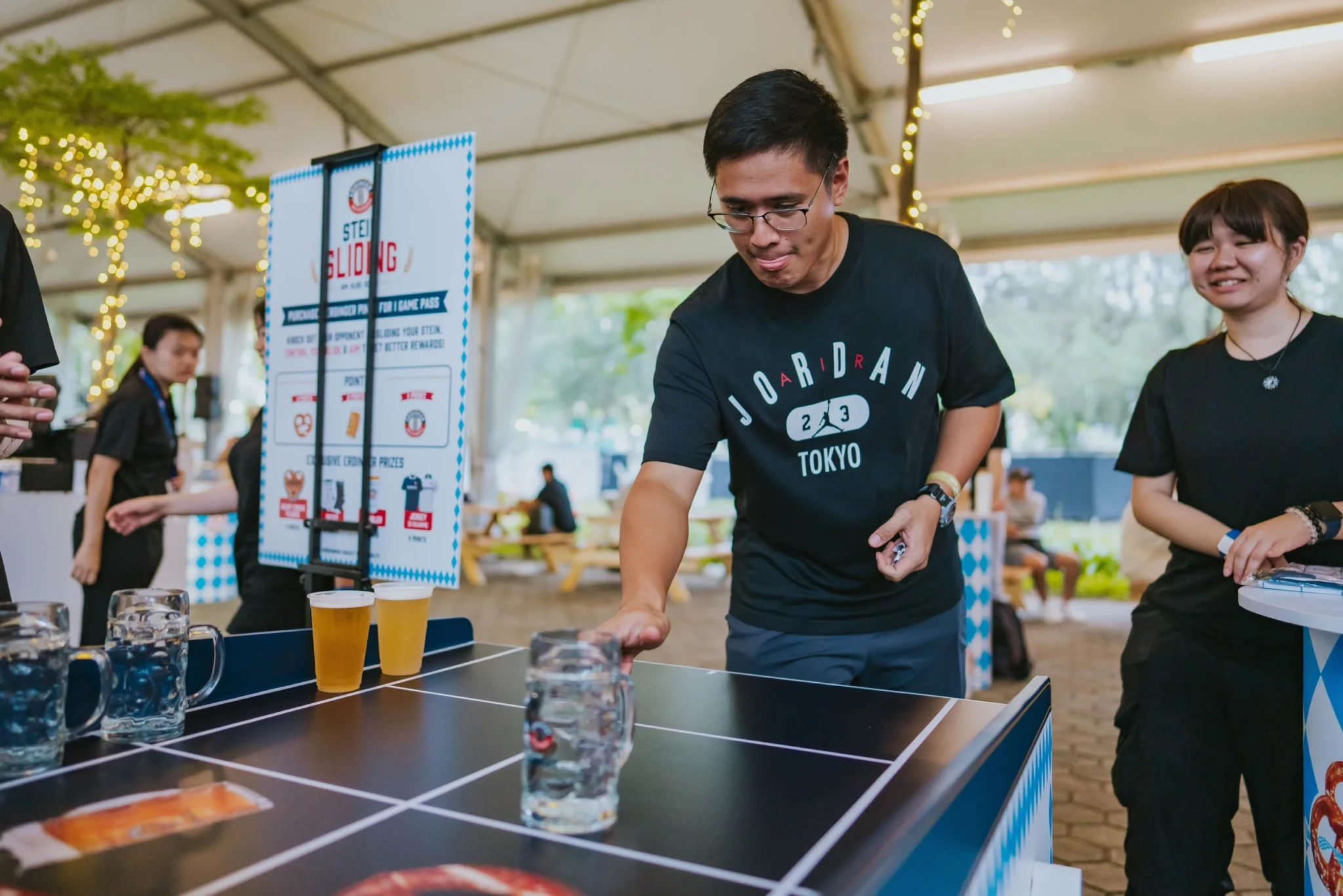 A visitor plays table tennis at the Feel Alive Zone at The Kallang