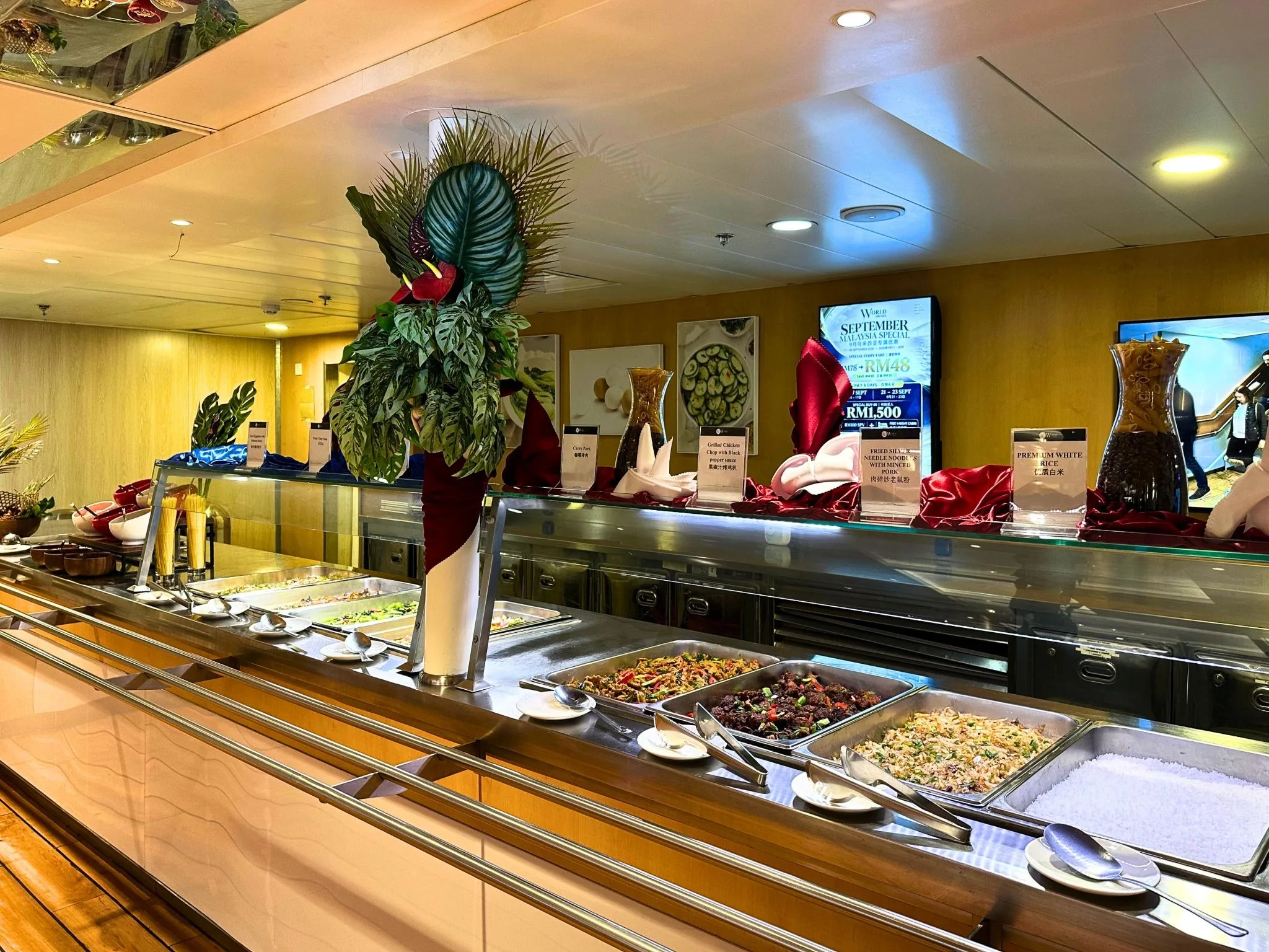 The upgraded international buffet aboard World Legacy with multiple serving stations