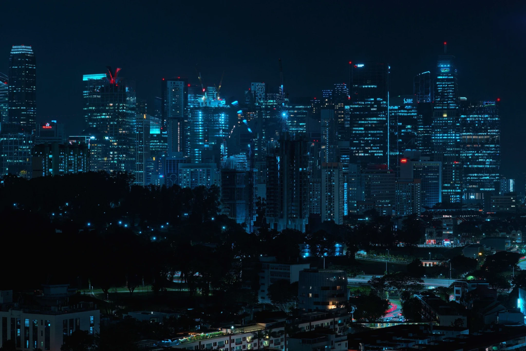 Still from Keith Loutit's The Lion City 2012–2026 showing Singapore's illuminated skyline at night