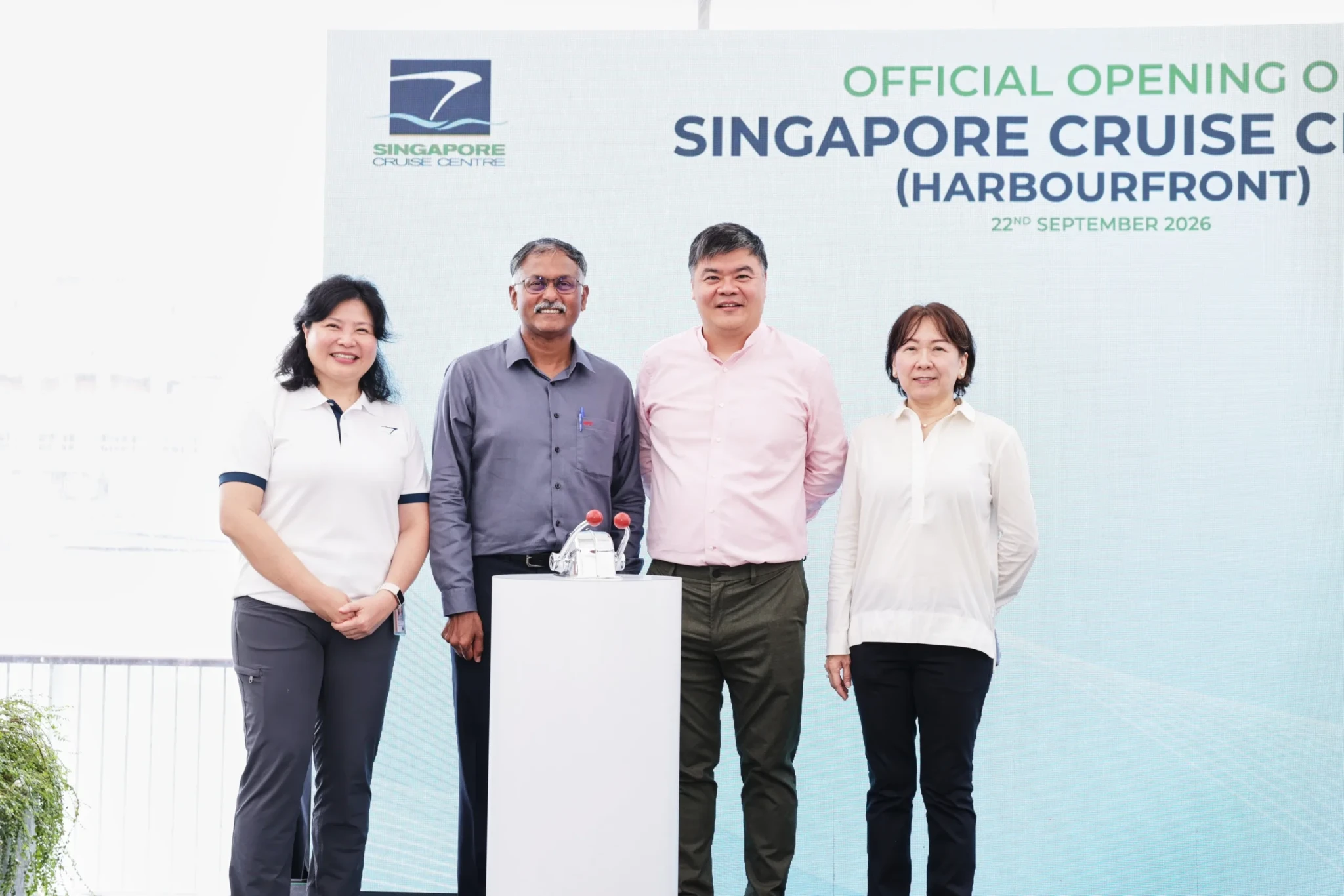 Four officials at the official opening of the new Singapore Cruise Centre HarbourFront terminal