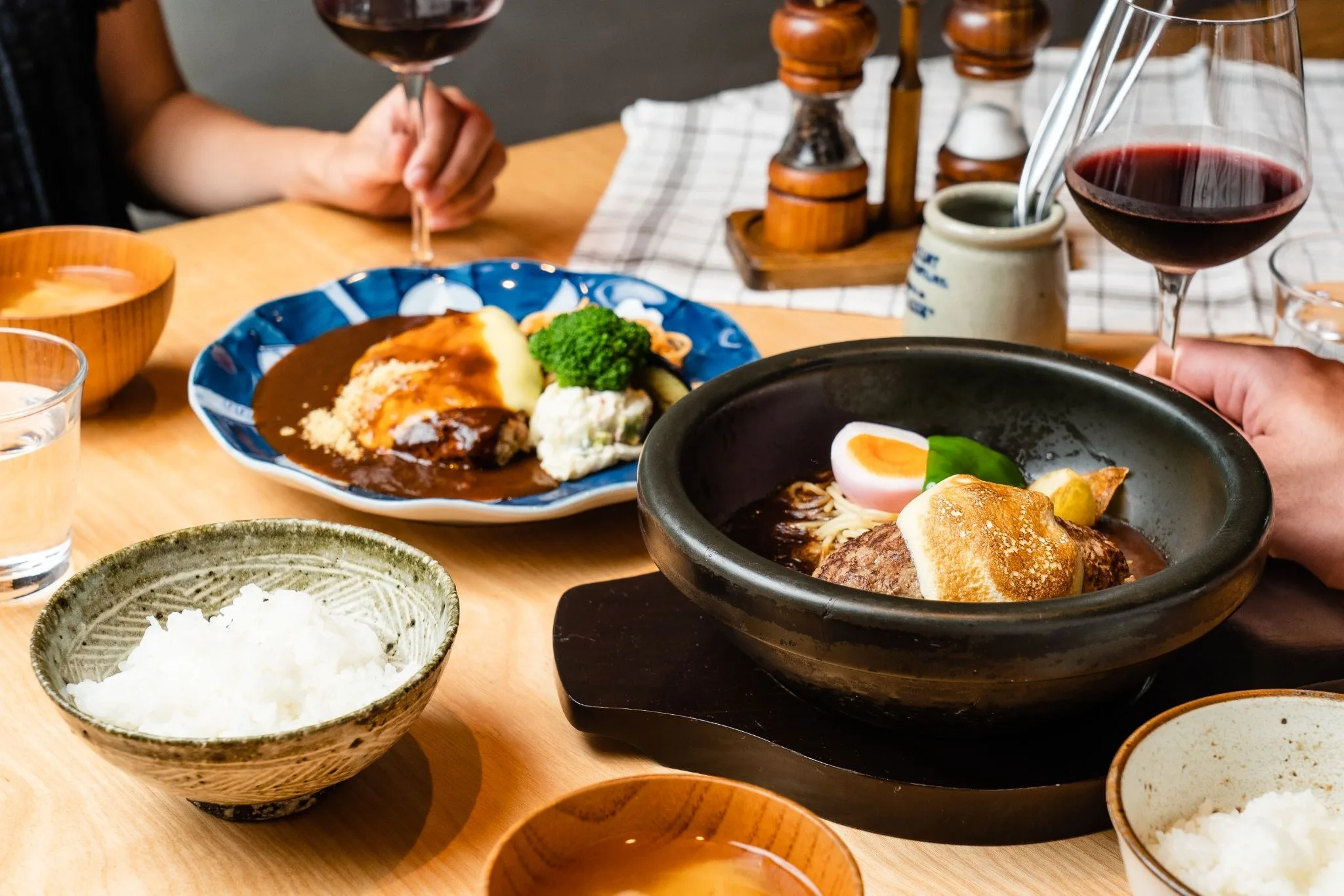 A Japanese hamburg steak plated with sides at Yamamoto's Hamburg in Singapore