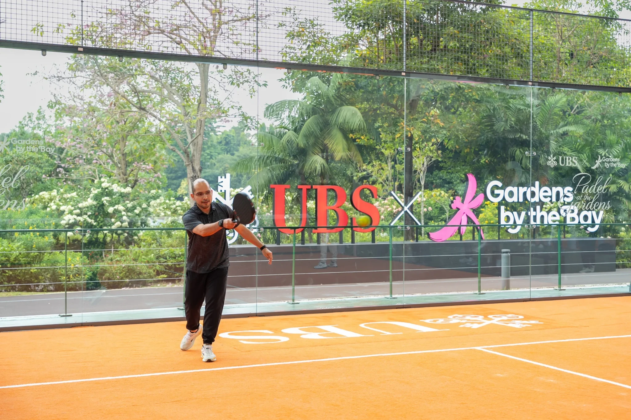 SPS Syed Harun Alhabsyi playing a shot during a padel rally at the Gardens by the Bay courts