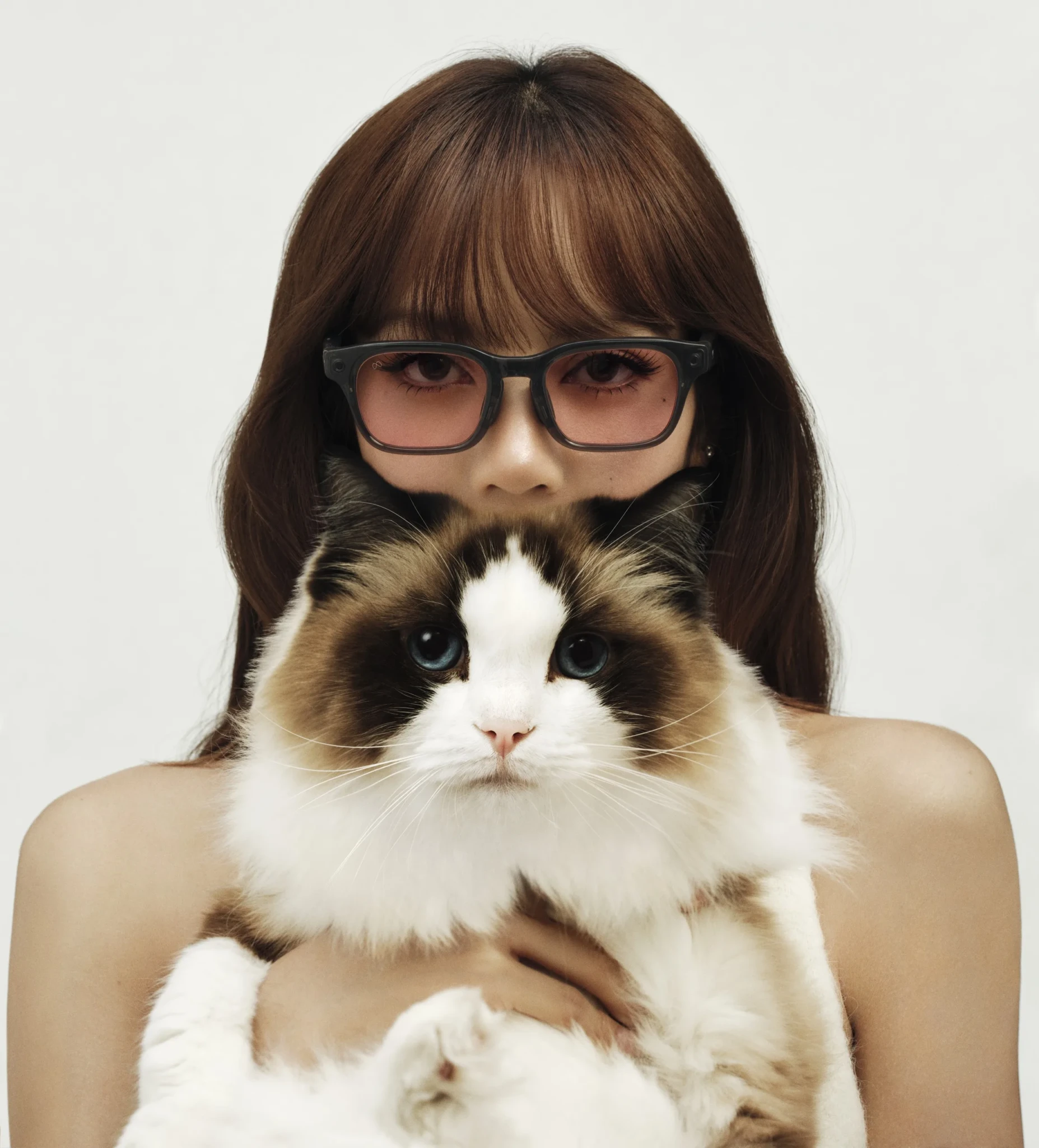 A wearer in the Meta Adventurer LISA Edition glasses holding a brown and white cat