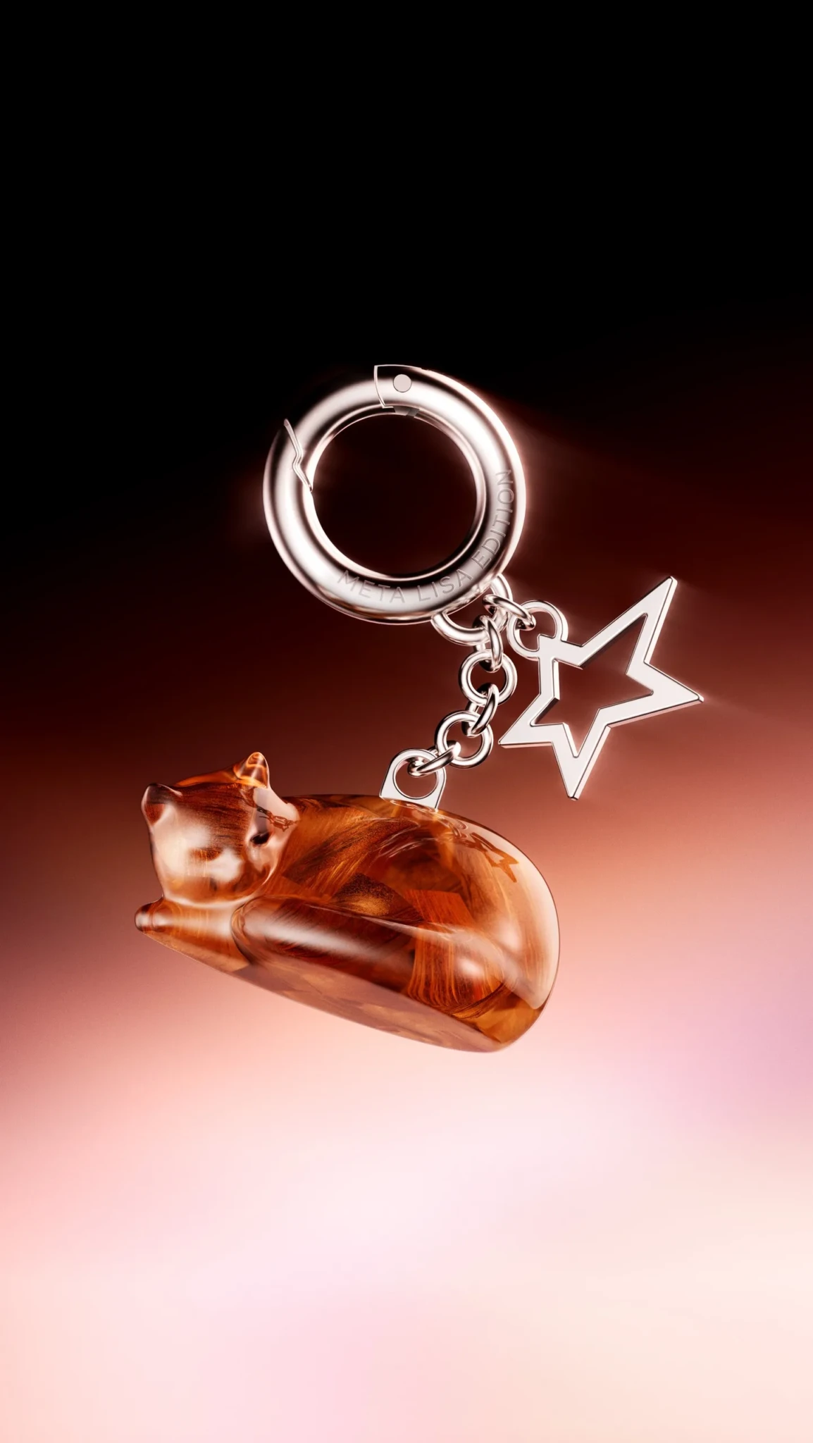 A Meta Glasses by LISA case charm of a sleeping amber cat with a silver keyring and star pendant