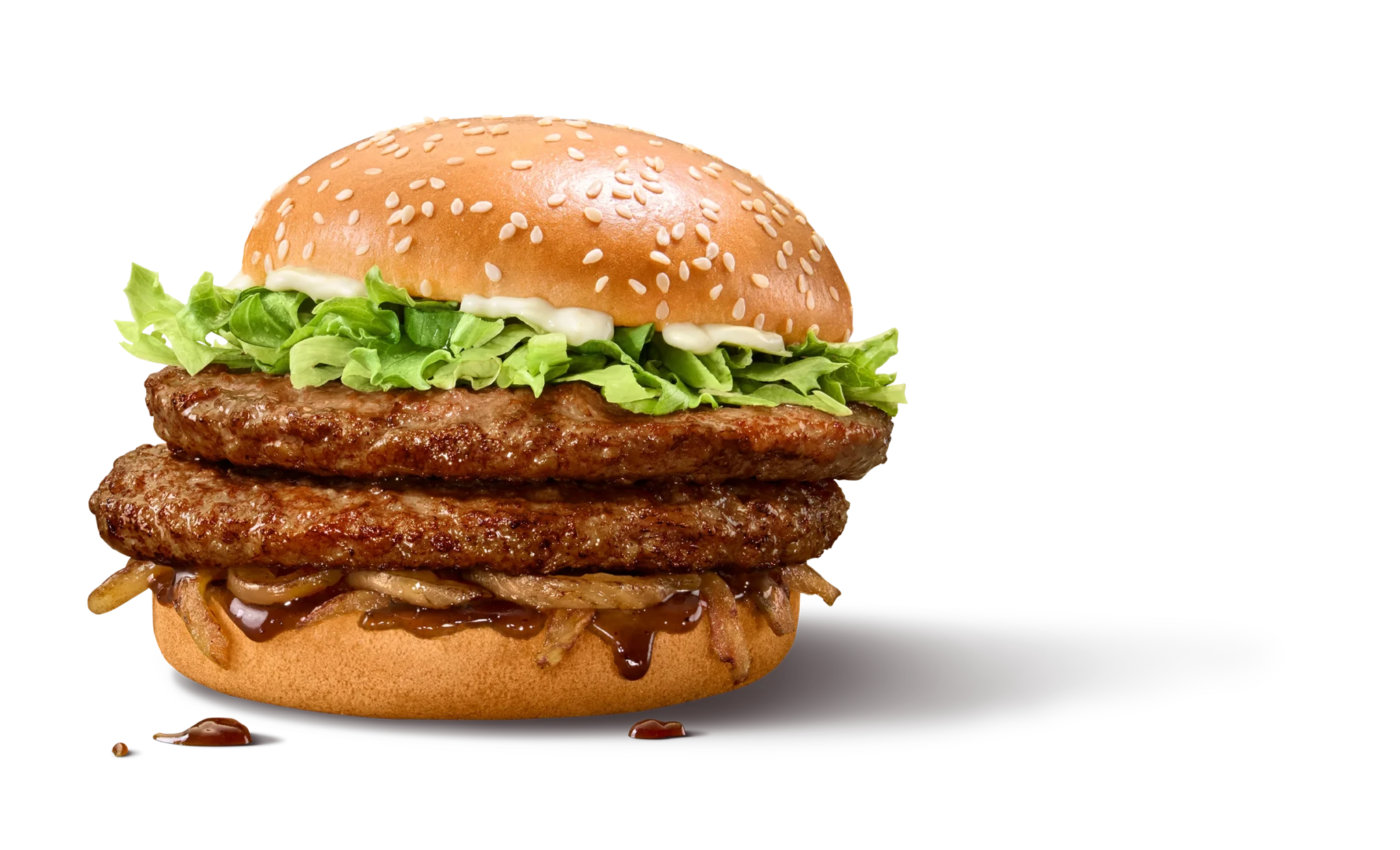 Double Bulgogi Beef Burger with two beef patties, lettuce and sauce on a sesame bun