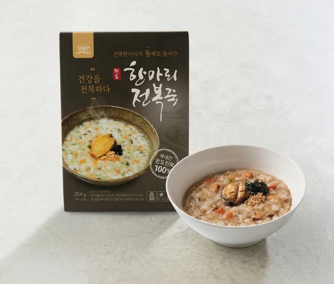 WANDO ABALONE Abalone Porridge, a 254g pouch beside a prepared bowl