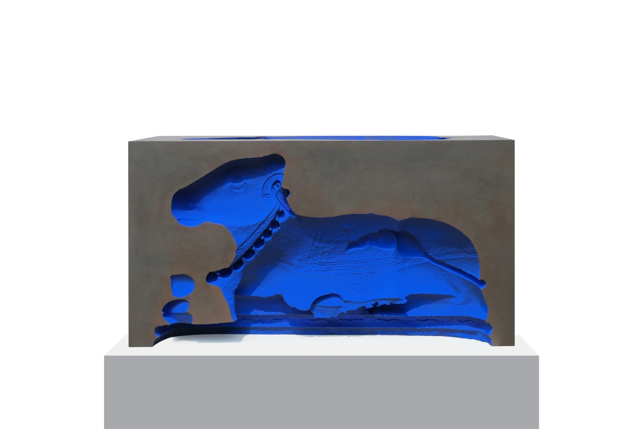 Blue 3D-printed sculpture of a reclining bull with deliberate digital distortions