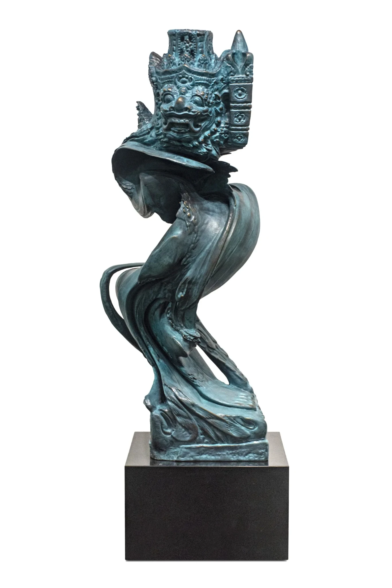 Bronze sculpture merging a Balinese mask with a distorted organic body