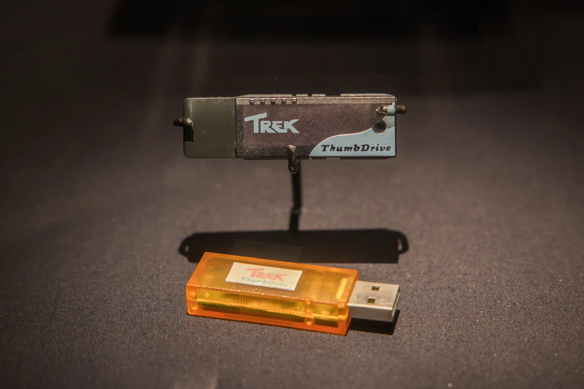 Prototype of the TREK ThumbDrive in front of the casing for its first commercial version