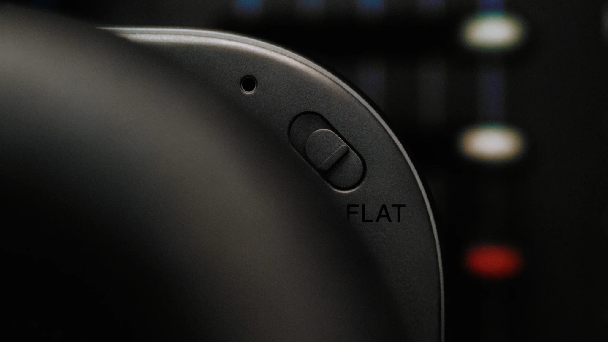 Close-up of Nothing Headphone (1) Pro earcup showing flat response mode button and microphone hole