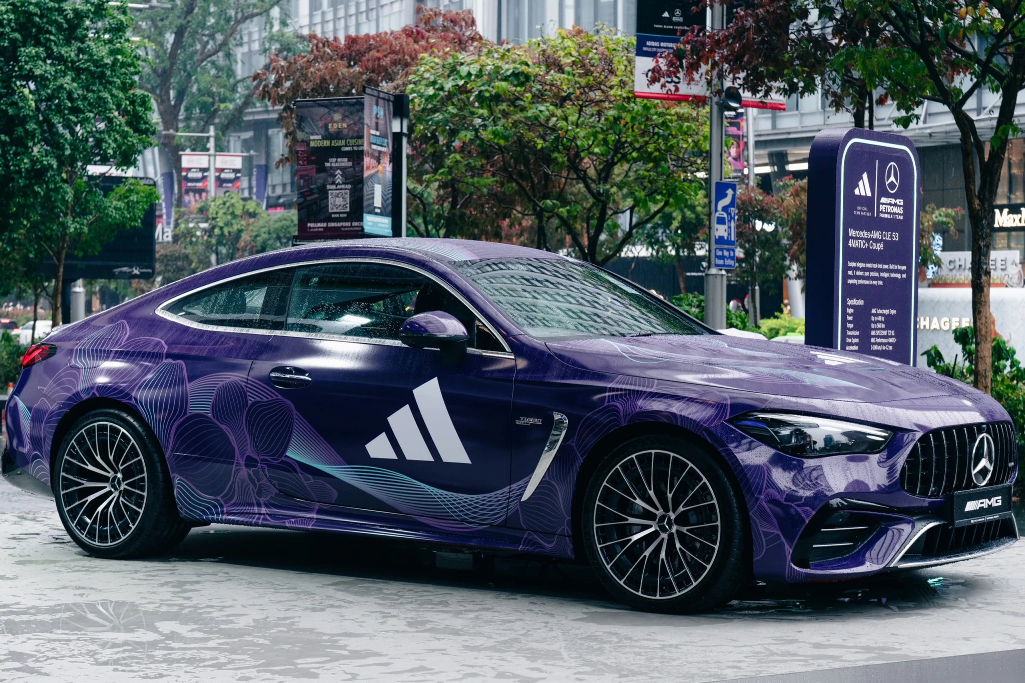 The Mercedes-AMG CLE 53 4MATIC+ Coupé wrapped in the Vanda Bloom Collection's deep purple floral livery