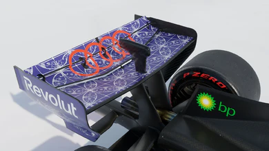 Audi Revolut F1 Team race car with Singapore-inspired purple Peranakan patterned livery and branded tires