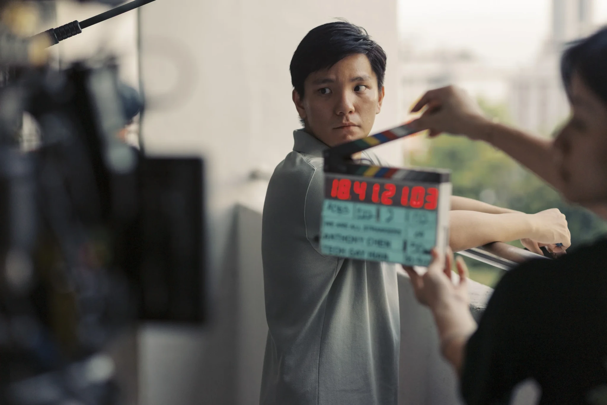 A clapperboard showing the film's title during production of We Are All Strangers