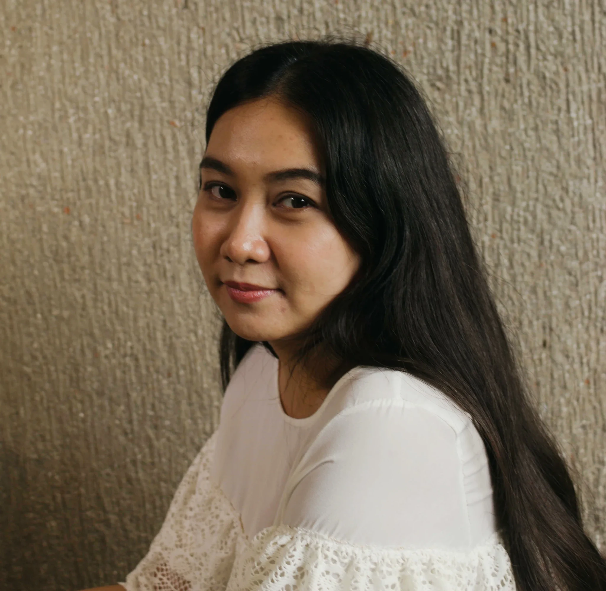 Portrait of Caris Avendaño Cruz, a writer appearing at the Singapore Writers Festival 2026