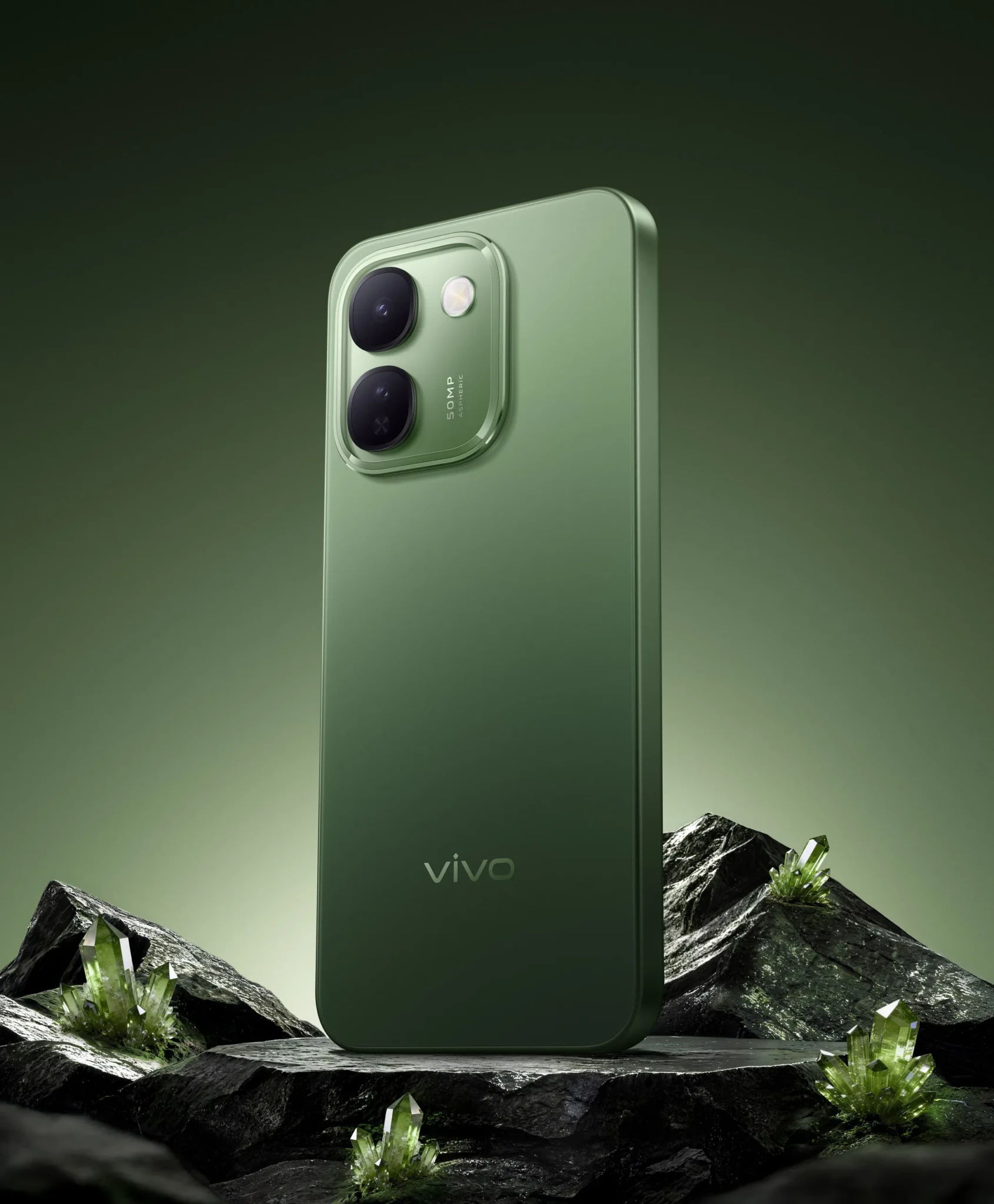 vivo V80 Lite 5G smartphone in Emerald Green with dual cameras, positioned on dark stone