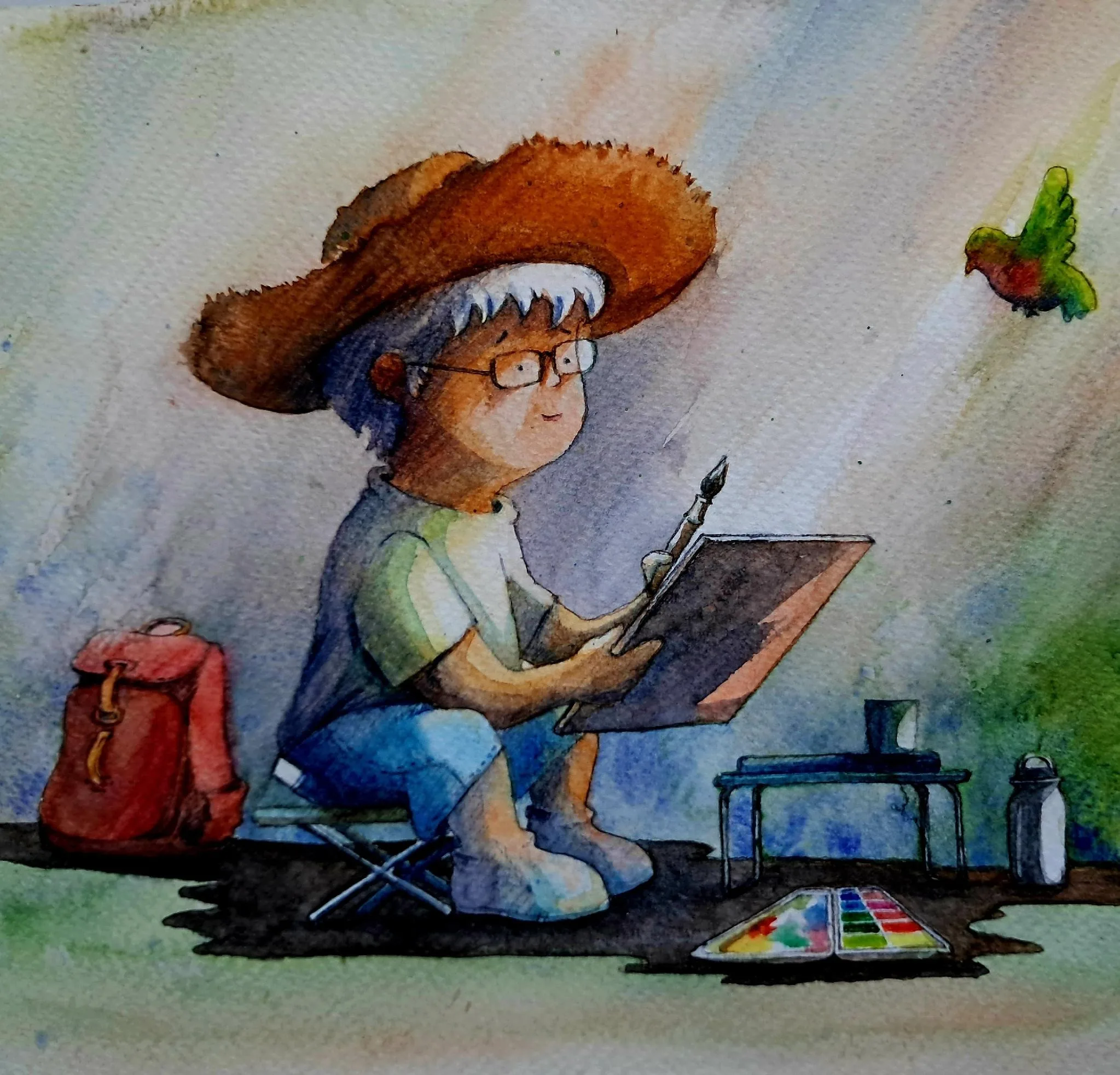 Watercolour illustration of an artist in a wide-brimmed hat seated at a portable easel, with a red backpack, camping stool, water bottle and palette around her