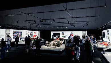Race cars inside the Formula 1 Exhibition hall.