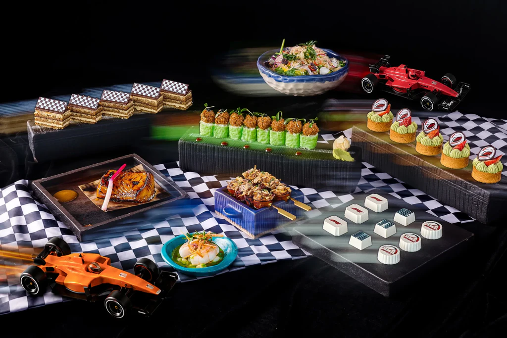 SUSHISAMBA Singapore's race-themed brunch spread, arranged with chequered cloth and model racing cars.