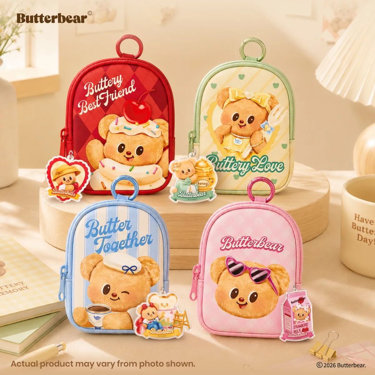 Butterbear blind box collection of eco bags and charms in red, green, blue and pink