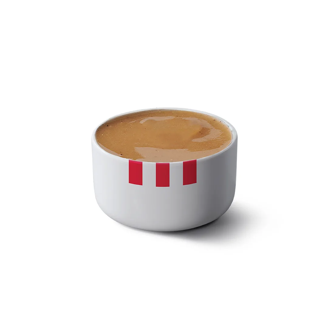 KFC O.R. Gravy in a white ceramic bowl with red stripes