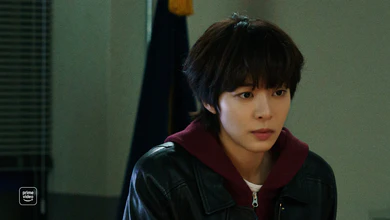 Seorina in a black leather jacket over a burgundy hoodie in a scene from Love in Disguise