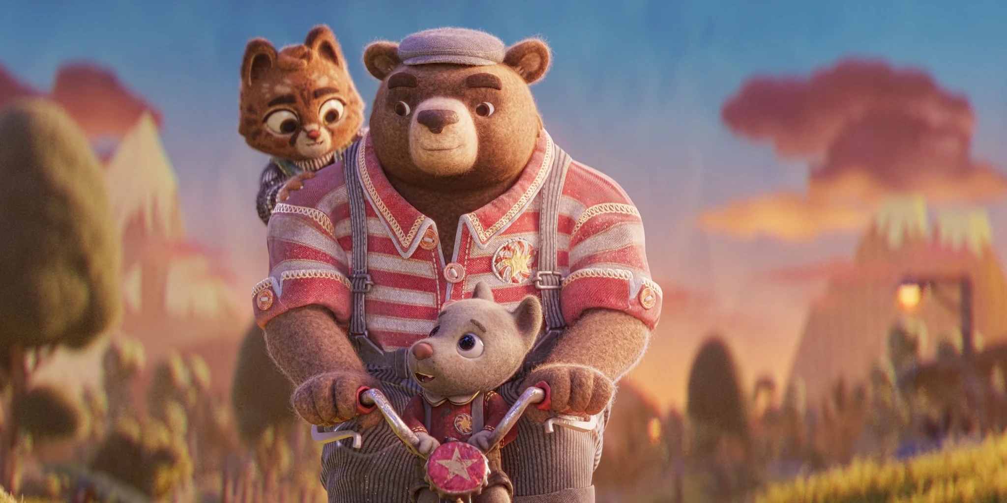 Animated key art of a young cat peeking over a bear in a striped shirt and cap who pedals a bicycle with a small mouse on the handlebars