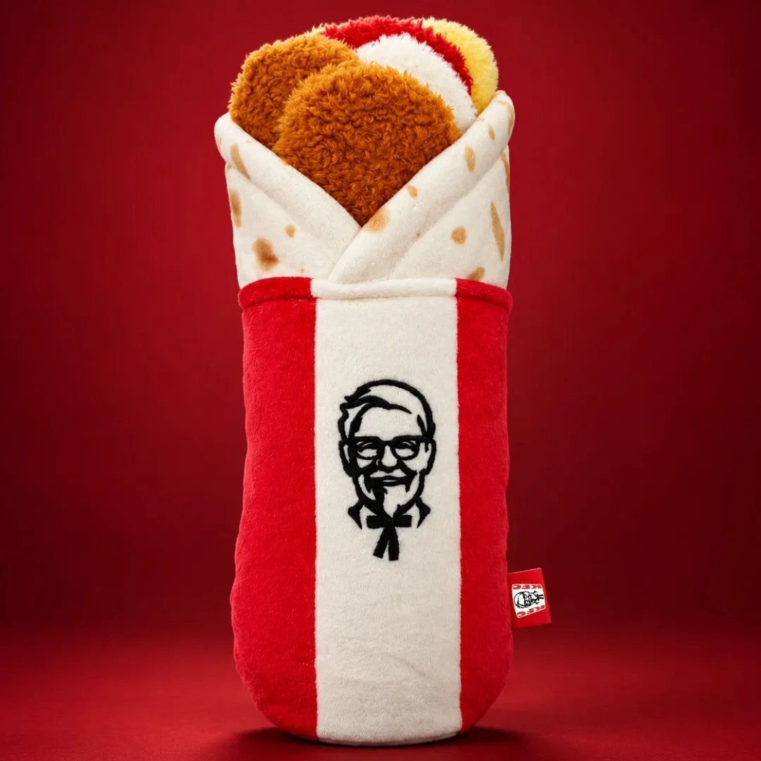 Breakfast Twister plushie, a soft toy shaped like a wrapped tortilla with fried chicken, with a Colonel Sanders emblem