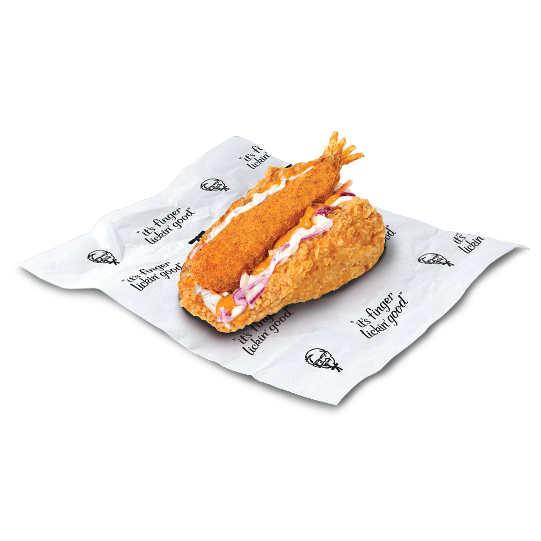 KFC Louisiana Surf N' Turf Kentaco: crispy chicken wrap with a fried shrimp, red onion and sauce, on branded paper